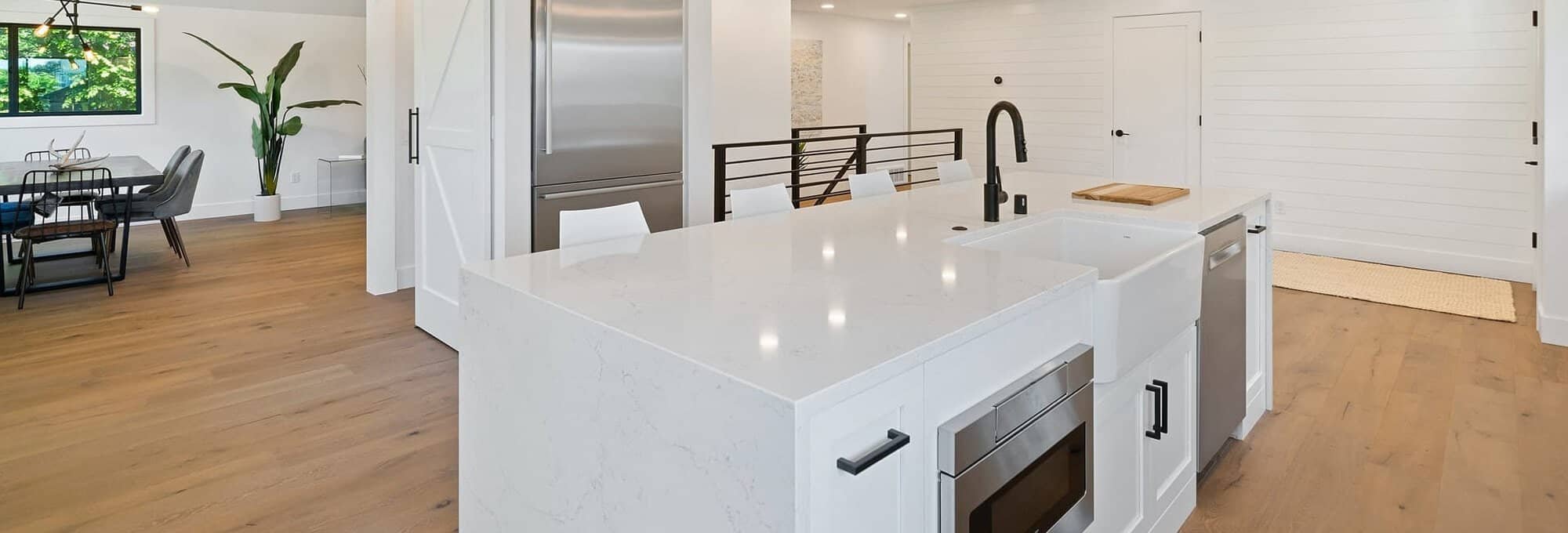 moisture resistant laminate flooring installed in modern kitchen by Flooring Connection Outlet in San Antonio, TX