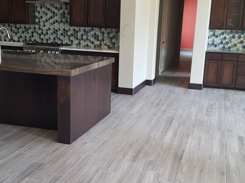 gray laminate floor by Flooring Connection Outlet in San Antonio, TX